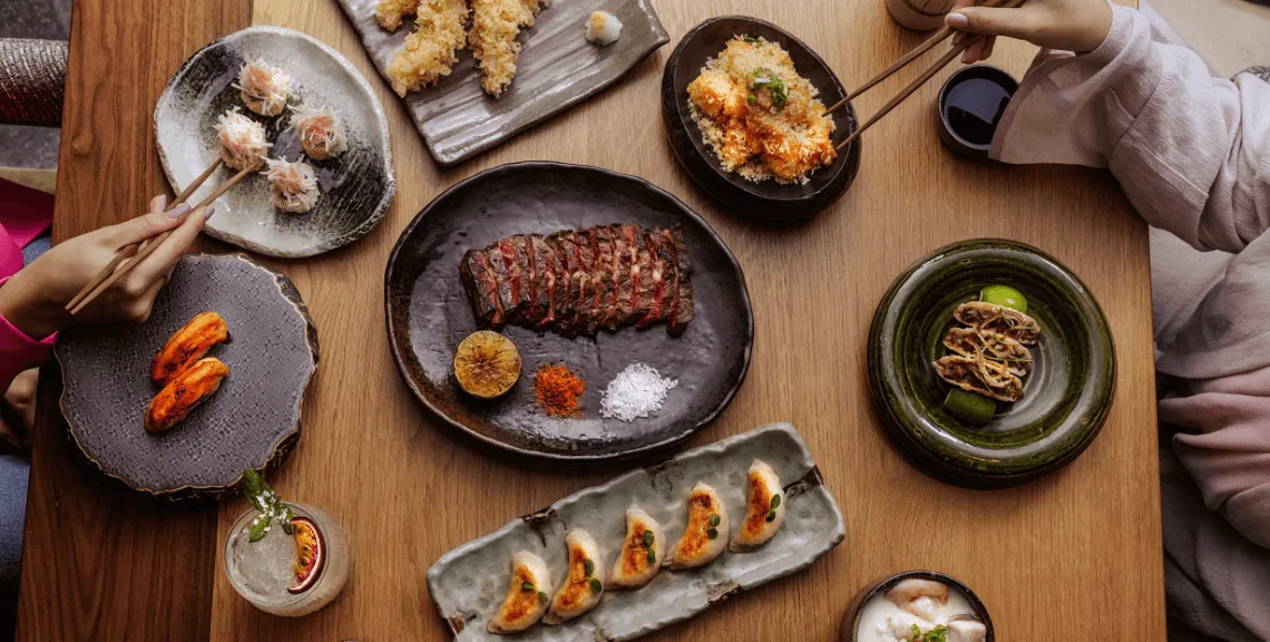 Seafood on a table with people
